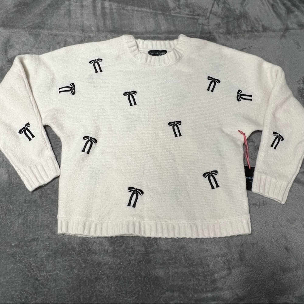 Cream Sweater with‎ Black Bow Accents